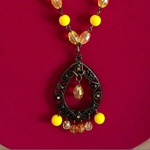 Yellow and Black Ornate Pendant Necklace